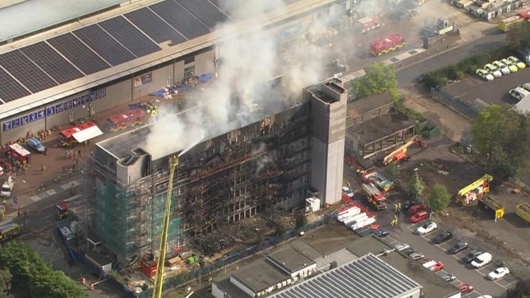 A rest centre has been set up after a burning tower block was evacuated in east London.