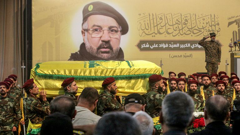 Hezbollah militants carried the coffin of Fuad Shukr. Pic: AP