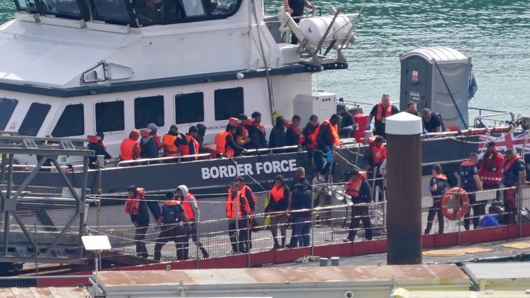 A group of people are brought in to Dover, Kent, from a Border Force vessel following a small boat incident in the Channel.
Pic: PA