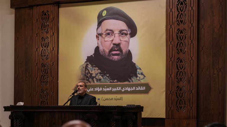 A man recites the Koran as Hezbollah officials and relatives of its top commander Fuad Shukr, who was killed in an Israeli strike, attend a condolences service ahead of his funeral, in Beirut, Lebanon, August 1, 2024. REUTERS/Alkis Konstantinidis
