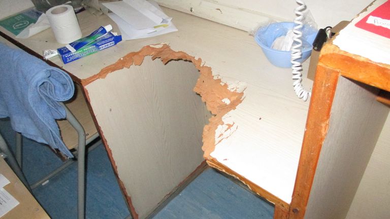 Images from report (by HM INSPECTORATE OF PRISONS) of HMP Wandsworth from an unannounced inspection in May 2024 (and published 06/08/2024). Copyright HM Inspectorate of Prisons. Induction wing damaged furniture