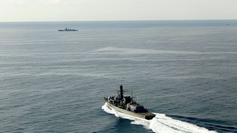 HMS Richmond (foreground) moves at speed to make contact with the Chinese destroyer Jiaozuo. Pic: Royal Navy