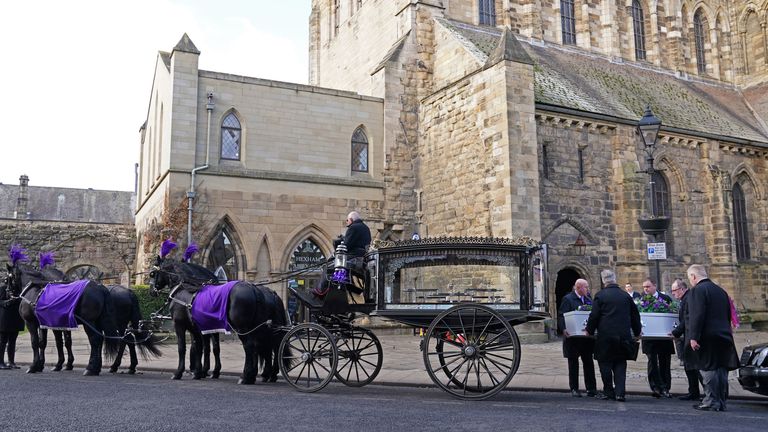 The funeral cortege for Holly Newton leaves Hexham Abbey in February last year. Pic: PA