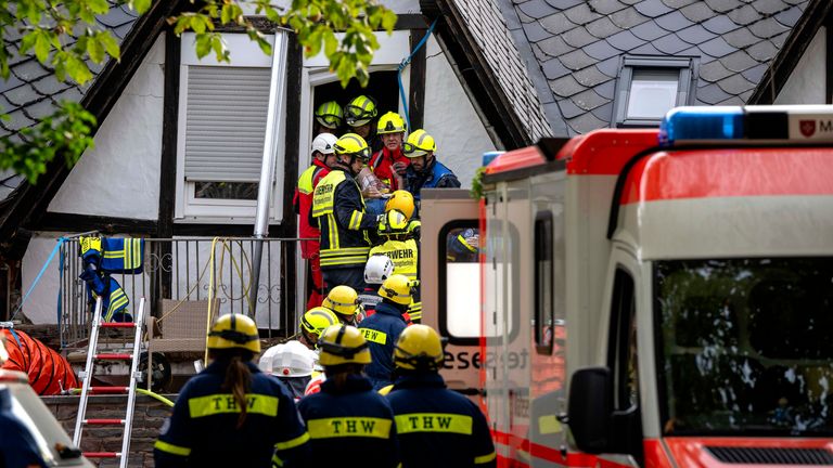 A person is rescued  from the partially collapsed hotel.  
Pic: DPA/AP