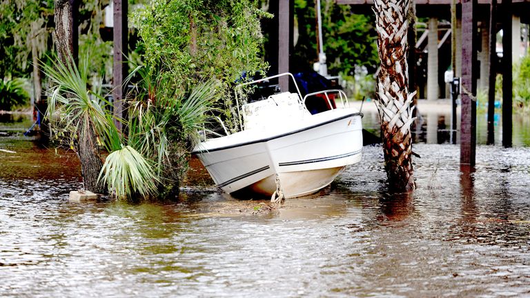A boat washed up while Hurricane Debby affects the gulf coast in Suwannee, Florida, U.S., August 5, 2024. REUTERS/Ricardo Arduengo