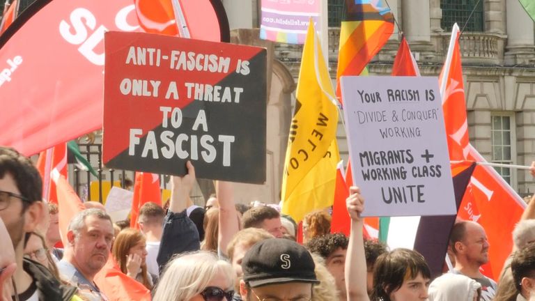 Anti-racism campaigners were kept away from immigration protestors outside Belfast City Hall on Saturday
