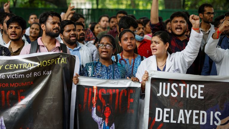 Doctors shout slogans during a protest demanding justice following the rape and murder of a trainee medic at a hospital in Kolkata, in New Delhi, India, August 19, 2024. REUTERS/Adnan Abidi
