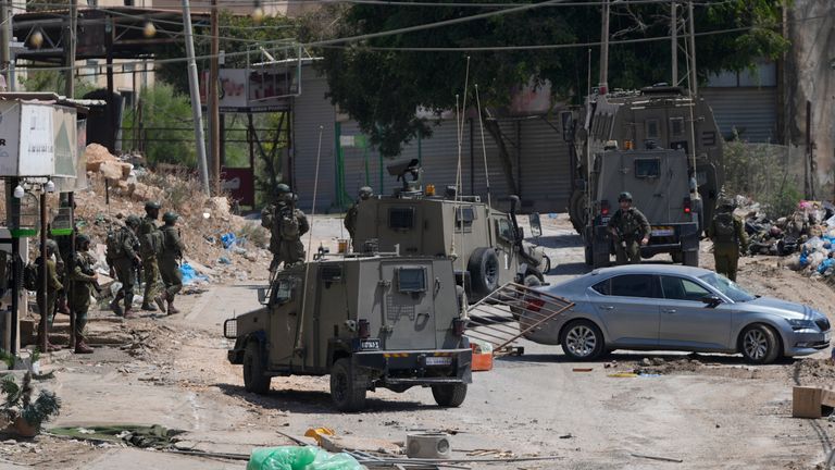 Israeli forces patrolling the West Bank refugee camp of Al-Faraa. Pic: AP