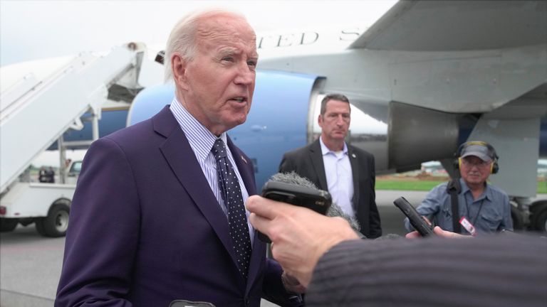 President Joe Biden speaks to reporters after arriving at Hagerstown, Md., for a brief stop en route to Camp David, Friday, Aug. 16, 2024. (AP Photo/Manuel Balce Ceneta)