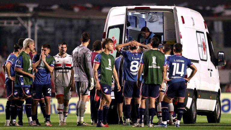 FILE PHOTO: Soccer Football - Copa Libertadores - Round of 16 - Second Leg - Sao Paulo v Nacional - Estadio Morumbi, Sao Paulo, Brazil - August 22, 2024 Nacional's Juan Izquierdo is carried off the pitch after sustaining an injury REUTERS/Carla Carniel/File Photo