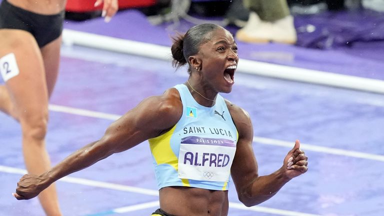 Julien Alfred, of Saint Lucia, celebrates after winning the women's 100 meters final at the 2024 Summer Olympics, Saturday, Aug. 3, 2024, in Saint-Denis, France. Pic: AP