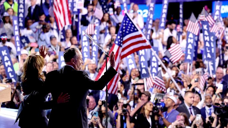 Democratic presidential nominee and U.S. Vice President Kamala Harris embraces her husband, second gentleman of the U.S. Doug Emhoff, following her acceptance speech on Day 4 of the Democratic National Convention (DNC) at the United Center in Chicago, Illinois, U.S., August 22, 2024. REUTERS/Mike Blake     TPX IMAGES OF THE DAY     