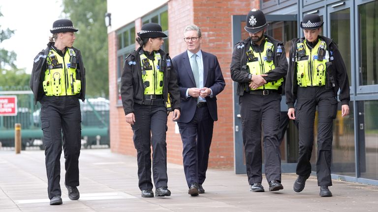 Keir Starmer speaks with members of the West Midlands Police Force at Arden Academy in Solihull, West Midlands.
Pic: PA