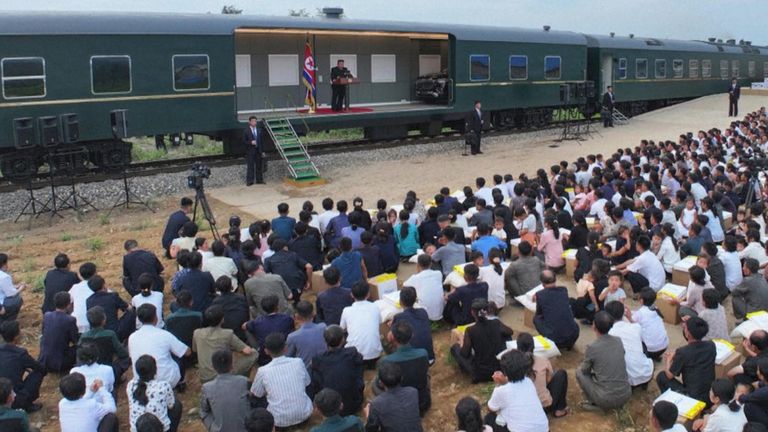 The front of Mr Kim's luxury armoured car can be seen peeping out of one of the carriages. Pic: AP