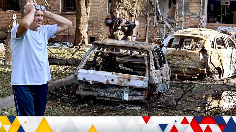 Burnt-out remains of cars outside a multi-storey residential building in Kursk. Pic: Reuters
