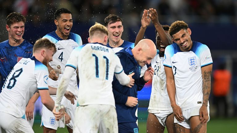 England's head coach Lee Carsley and his players celebrate their 1-0 victory in the Euro 2023 U21 Championship final soccer match between England and Spain.
Pic: AP