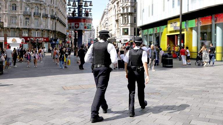 Police officers patrol at Leicester Square.
Pic: Reuters