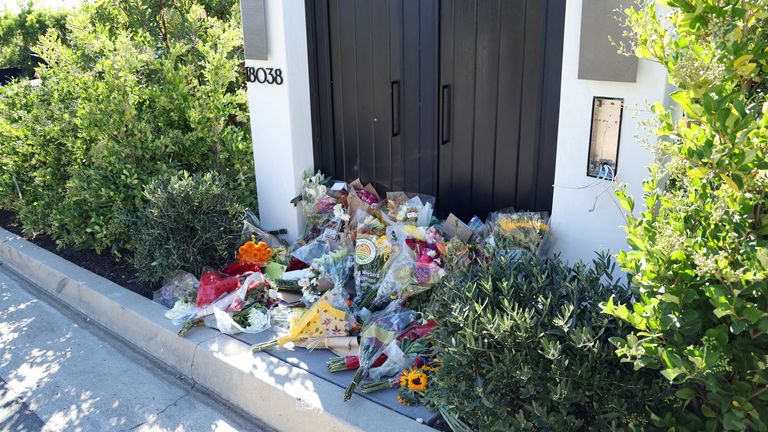 Flowers are pictured outside the home of late actor Matthew Perry in Pacific Palisades, California, U.S., October 31, 2023. REUTERS/Mario Anzuoni