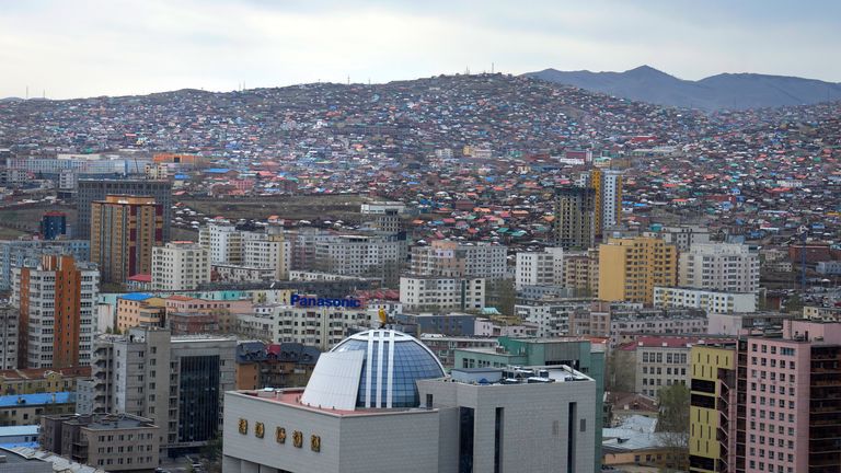 High rise buildings are seen on the skyline of Ulaanbaatar, the capital of Mongolia, Monday, May 22, 2023. Mongolia, a nation bordered by China and Russia, is known for vast, rugged expanses and nomadic culture.(AP Photo/Manish Swarup)