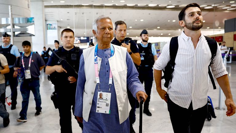 Nobel laureate Muhammad Yunus, who was recommended by Bangladeshi student leaders as the head of the interim government in Bangladesh, walks at Paris Charles de Gaulle airport in Roissy-en-France, France.
Pic: Reuters