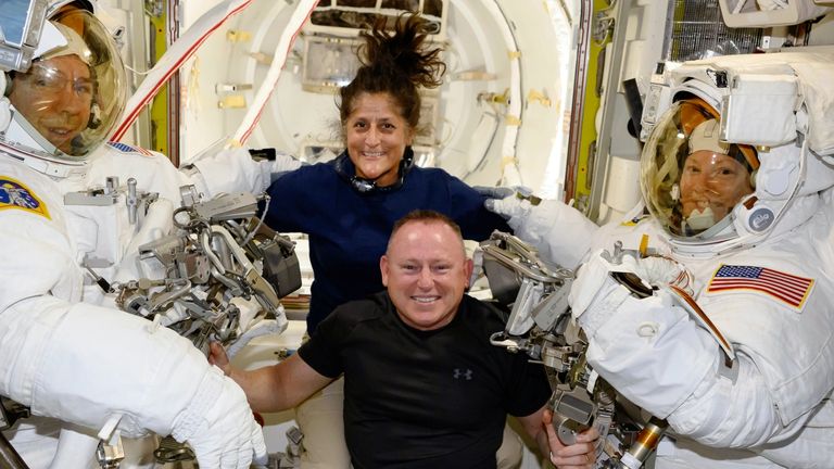 FILE - In this photo provided by NASA, Boeing Crew Flight Test astronauts Suni Williams and Butch Wilmore, center, pose with Expedition 71 flight engineers Mike Barratt, left, and Tracy Dyson aboard the Quest airlock of the International Space Station on June 24, 2024. (NASA via AP, File)