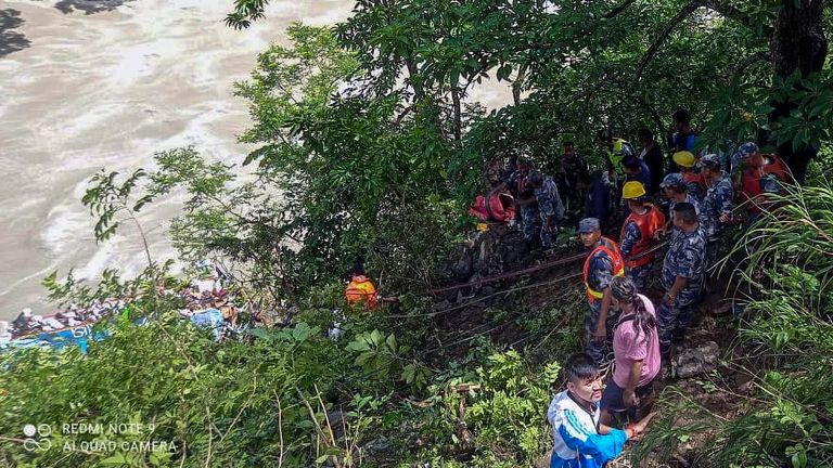 APF personnel carrying out rescue operation after a bus carrying Indian pilgrims fell into a river near Abukhaireni town, about 75 miles west of the capital, Kathmandu, Nepal
Pic: Nepal Armed Police/AP