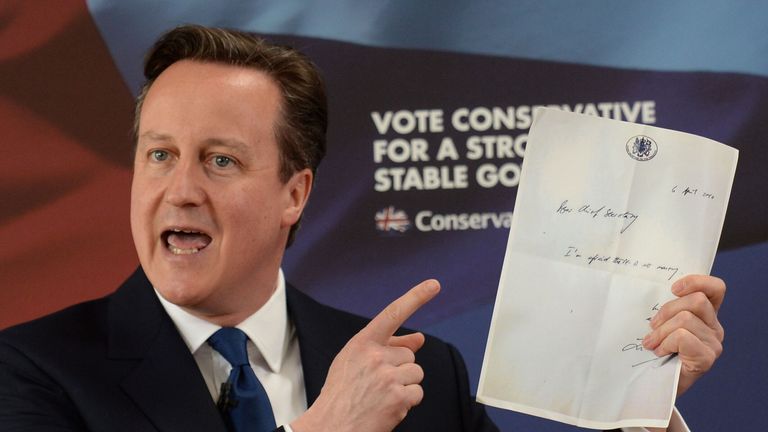 Prime Minister David Cameron holds up a note that Liam Byrne left on his desk at the Treasury after the Labour Party's election defeat in 2010. Image: PA