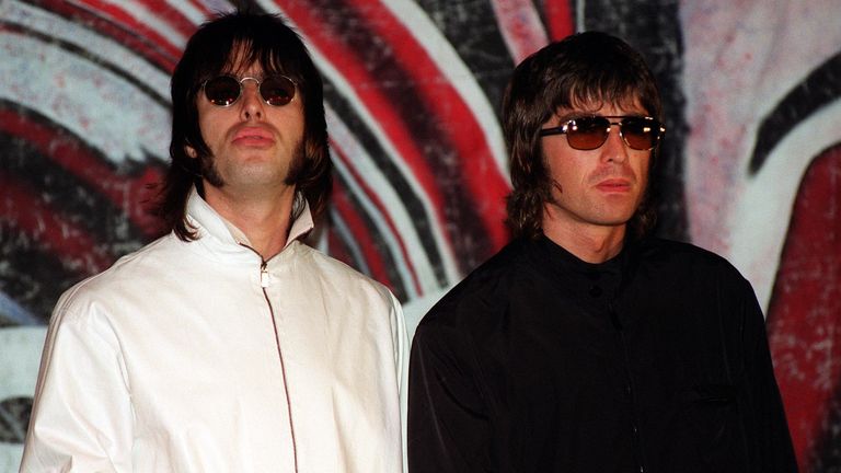 Liam (L) and Noel Gallagher from the band Oasis at a press conference in London to announce that bass player Paul 'Guigsy' McGuigan has quit the band - a little over two weeks after guitarist Paul 'Bonehead' Arthurs did the same. * 3/1/02: Naked Chef Jamie Oliver has been voted the top celebrity neighbour ahead of TV cooking rival Lawson. The BBC2 presenter topped a poll of stars that people would want living next to them in a poll by Your Home magazine and savings firm Birmingham Midshires. Nei