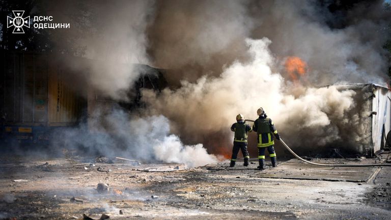 Firefighters work at the site of a Russian missile strike in Odesa.
Pic: Emergency Service of Ukraine in Odesa/Reuters