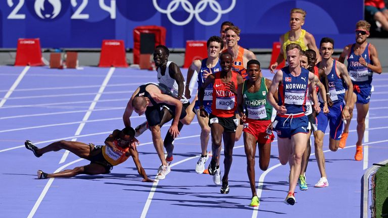 In the moments of heat 1, George Mills and Spain's Thierry Ndikumwenayo fell after a collision. Pic: Reuters