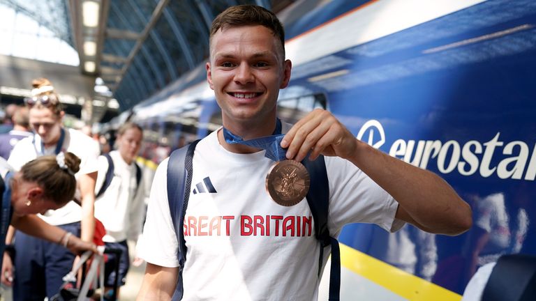 Lewis Richardson of Great Britain arrives by Eurostar at London's St. Pancras International railway station after competing at the 2024 Paris Olympic Games in France. Photo date: Monday, August 12, 2024. Jordan Pettitt/PA Wire