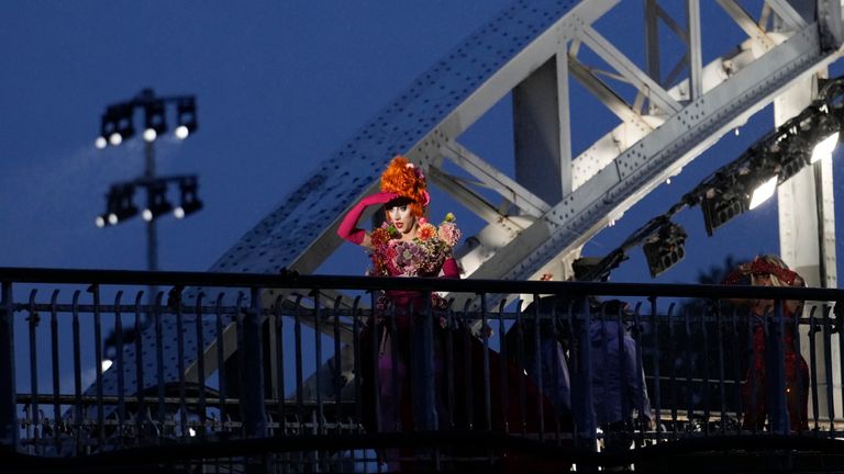 Drag queens prepare to perform on the Debilly Bridge in Paris, during the opening ceremony of the 2024 Summer Olympics, Friday, July 26, 2024.(AP Photo/Tsvangirayi Mukwazhi, File)