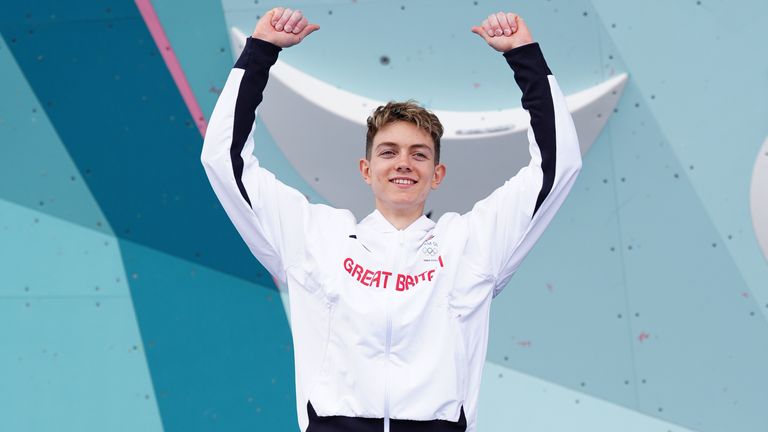 Great Britain's Toby Roberts on the podium after winning the gold medal in the Men's Boulder & Lead, Final at Le Bourget Climbing Venue on the fourteenth day of the 2024 Paris Olympic Games in France. Picture date: Friday August 9, 2024.