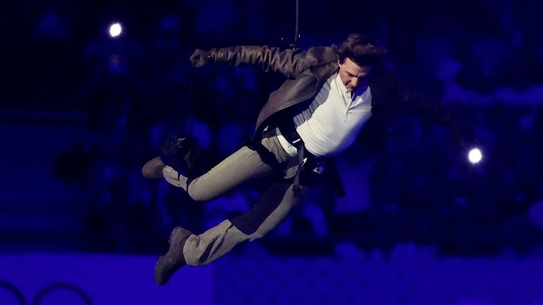 Cruise jumped from the roof of the stadium during the ceremony. Pic: Reuters
