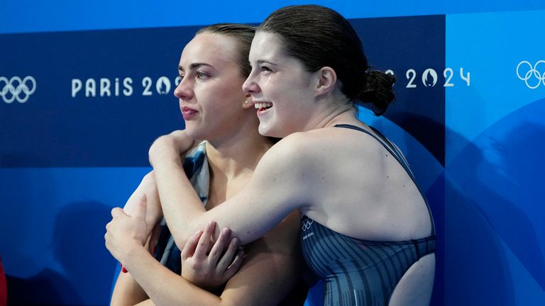 Andrea Spendolini Sirieix and Lois Toulson celebrate after winning the bronze medal in the women's synchronised 10m platform diving final. Pic: AP