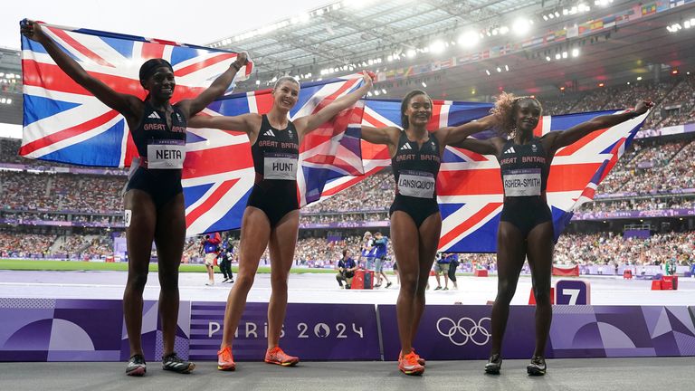 (L-R) Great Britain's Daryll Neita, Amy Hunt, Imani Lansiquot and Dina Asher-Smith celebrate winning silver in the Women's 4 x 100m relay. Pic: PA