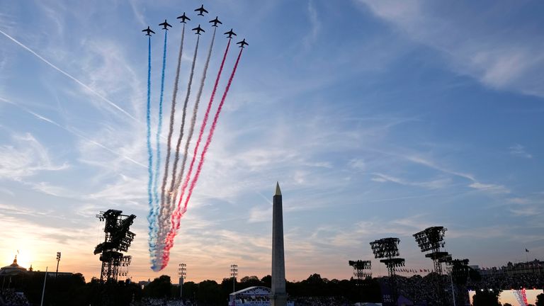 Aircraft of the Patrouille de France flying over Paris. Pic: AP
