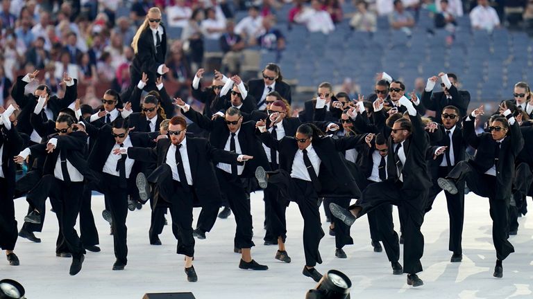 Dancers on stage during the opening ceremony. Pic: PA