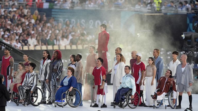 French artist Christine and the Queens performs during the opening ceremony. Pic: PA