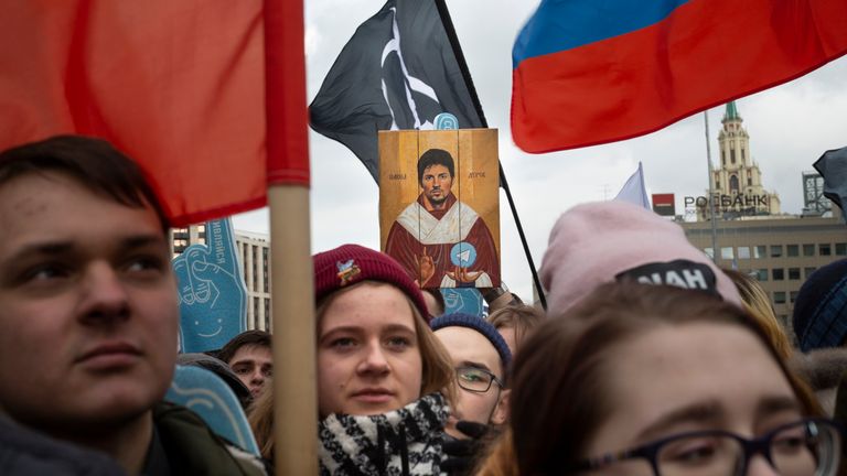 Demonstrators hold a portrait of messaging app Telegram co-founder Pavel Durov as an icon, during the Free Internet rally in response to a bill making its way through parliament calling for all internet traffic to be routed through servers in Russia — making VPNs (virtual private networks) ineffective, in Moscow, Russia, Sunday, March 10, 2019.