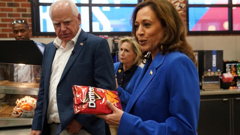 Kamala Harris shops for snacks at a service station in Pennsylvania.
Pic: Reuters