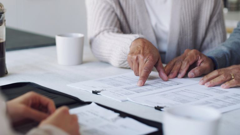 A couple work out their finances. Pic: iStock