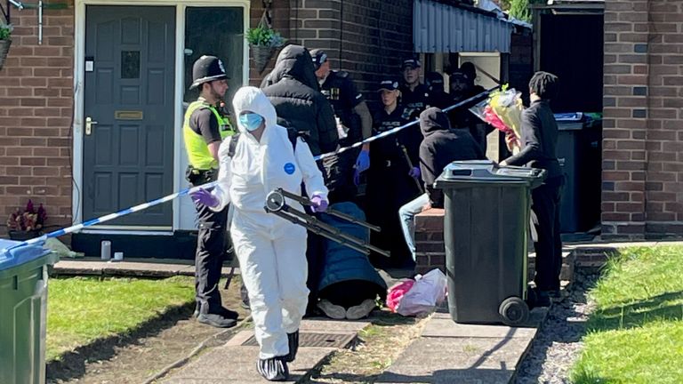 Police officers at the scene in Lovett Avenue, Oldbury after a 13-year-old boy has been stabbed to death at a house, sparking a murder investigation.
Pic: PA