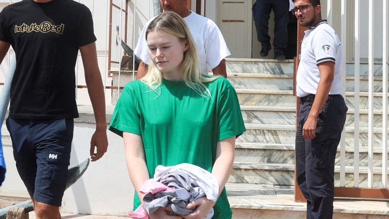 Flight attendant Katja Chicken lands at Porticello on Monday. Photo: Reuters