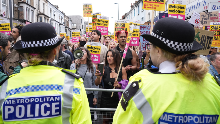 Demonstrators and police officers at an anti-racism protest in Walthamstow. Pic: Reuters