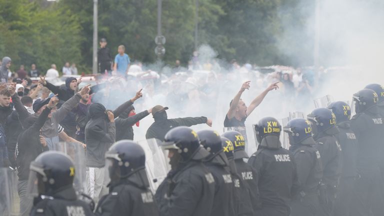 Officers clashed with protesters during a protest outside the Holiday Inn Express, which houses asylum seekers in Rotherham.  Photo: PA