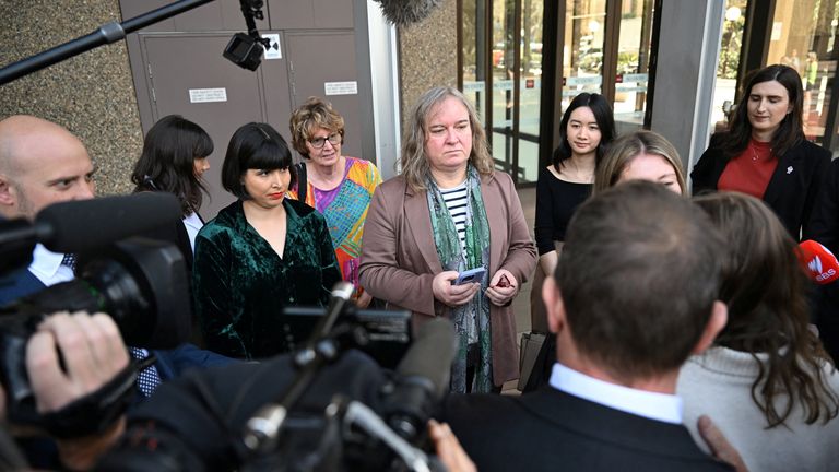 Roxanne Tickle leaves the Federal Court of Australia.
Pic: Reuters