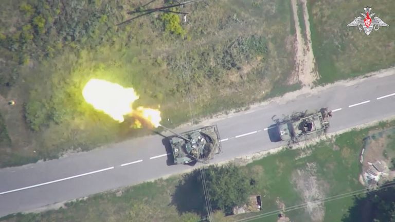 An aerial view shows what is said to be a firing Ukrainian tank in the area bordering Ukraine in the Kursk region, Russia, in this still image from video released August 11, 2024. Russian Defence Ministry/Handout via REUTERS ATTENTION EDITORS - THIS IMAGE HAS BEEN SUPPLIED BY A THIRD PARTY. NO RESALES. NO ARCHIVES. MANDATORY CREDIT. WATERMARK FROM SOURCE.