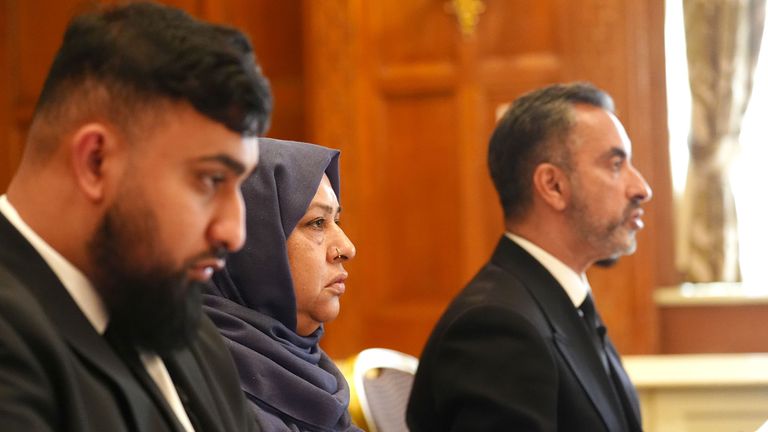 Shameem Akhtar, with her son, Muhammad Amaad called for calm from the community. Pic: PA