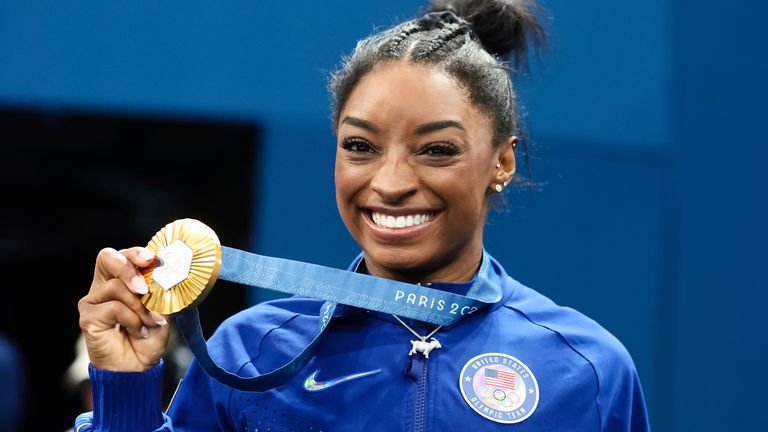 Simone Biles makes history yet again as she becomes oldest female gymnast  to win all-around Olympic gold | World News | Sky News